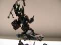 Chaos herald of Tzeentch with disc of Tzeentch