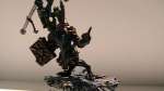 Chaos herald of Tzeentch with disc of Tzeentch